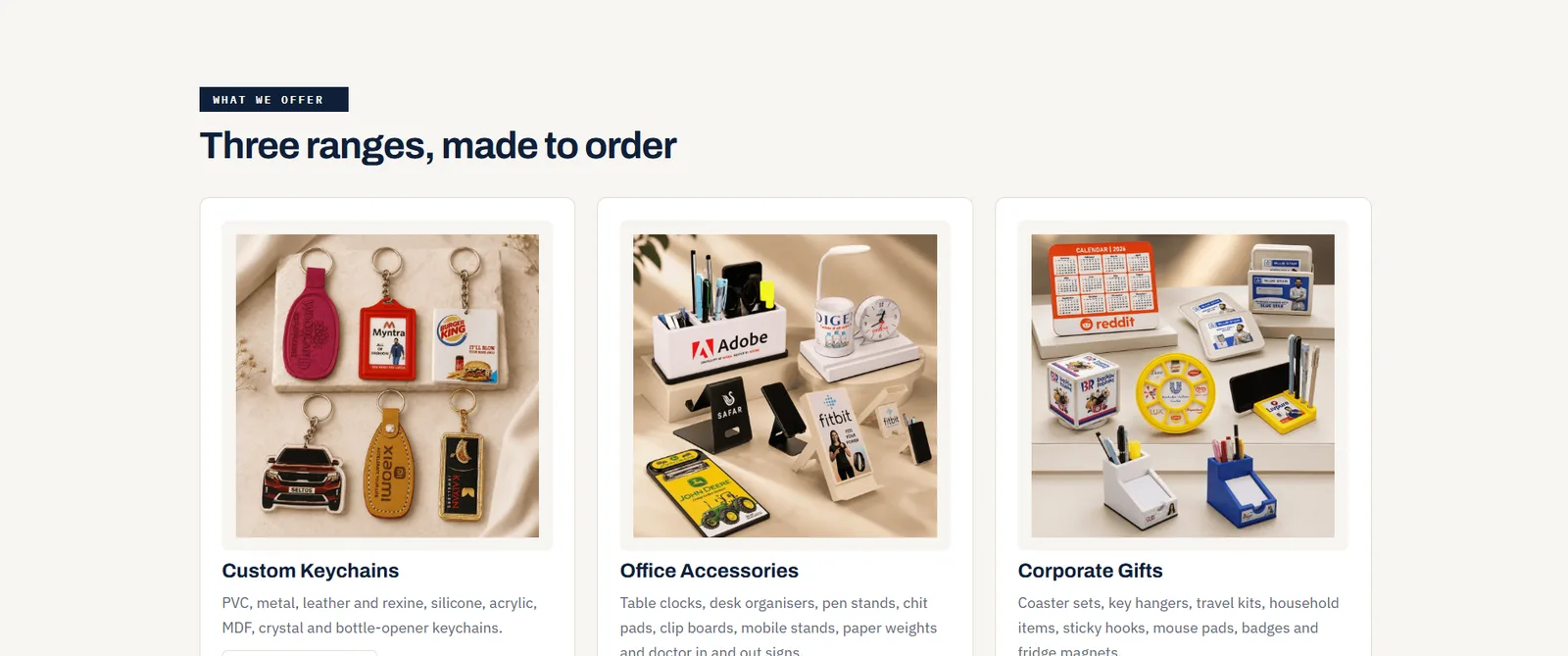 Three range cards — custom keychains, office accessories and corporate gifts — each with a photograph of the goods and the materials or objects it covers listed beneath.