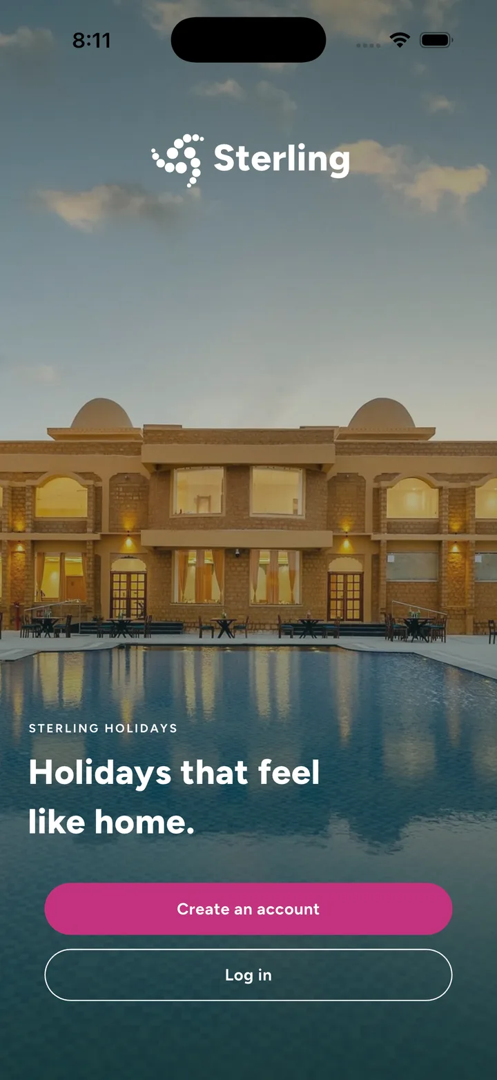 The opening screen: the app wordmark over a lit poolside photograph, one line about the membership, and two buttons — create an account, or log in.